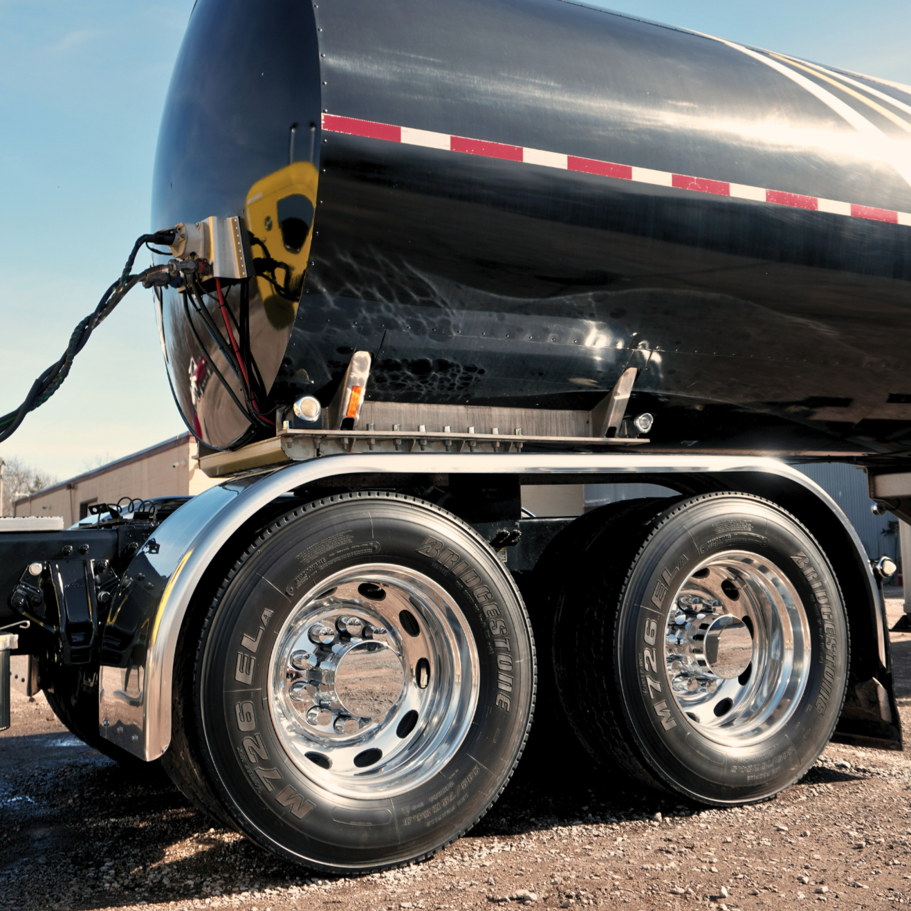 Tires of a fleet vehicle that have been waxed & shined