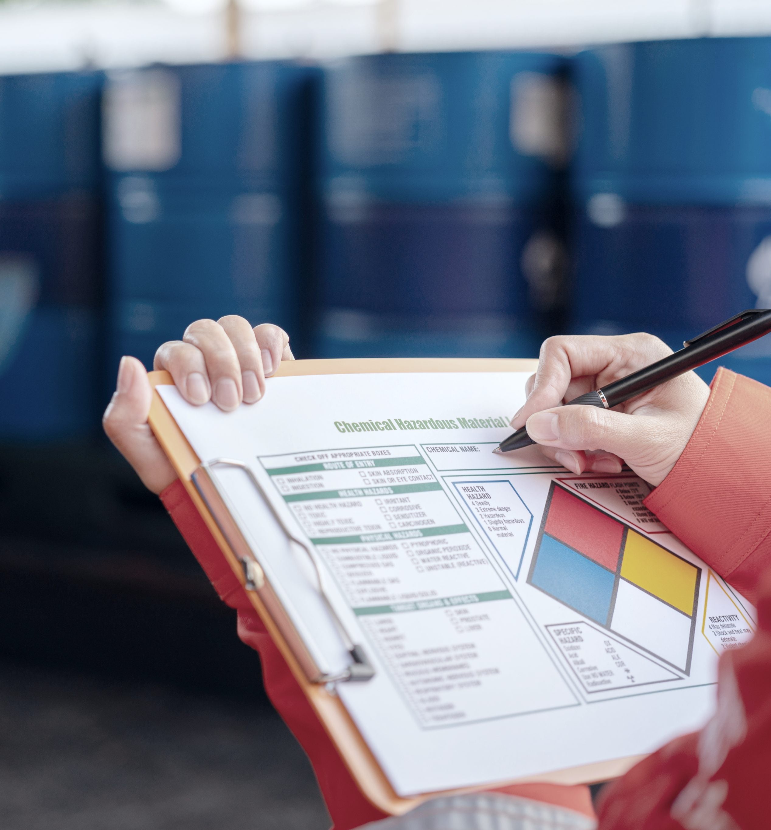Hands holding clipboard